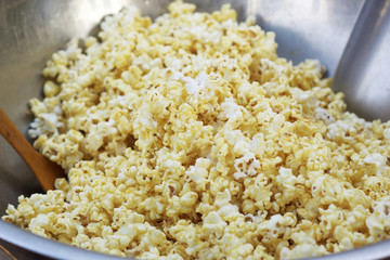 popcorn a caramel coated in a bowl.