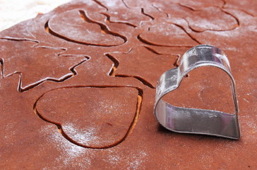Shape of cookie cutters and dough for gingerbread