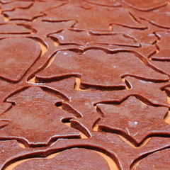 Dough for gingerbread in shape of christmas tree and star