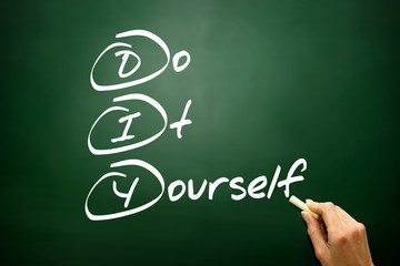 Do It Yourself (DIY), business concept acromym on blackboard