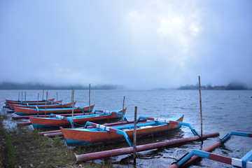 Boats in the misty twilight