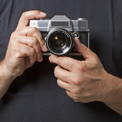 Holding a retro camera