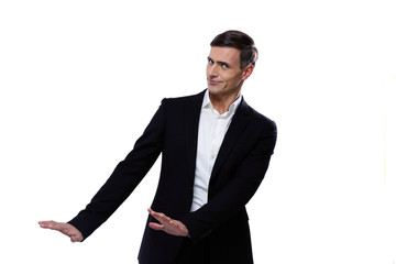 Businessman expressing refusal with open hand