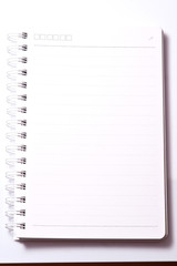 Blank Spiral Notebook with Line Paper Isolated on a White Backgr
