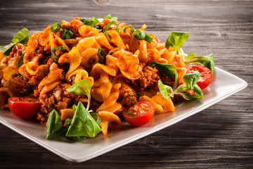 Pasta with meat, tomato sauce and vegetables