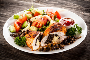 Grilled chicken fillets and vegetables