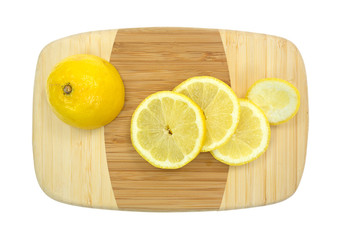 Small cutting board with lemon and slices