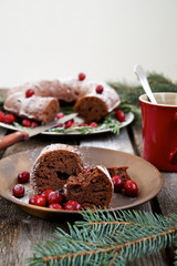 Fototapeta na wymiar Christmas chocolate cake on a wooden background
