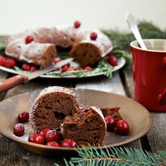 Christmas chocolate cake on a wooden background