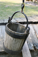 The old wooden bucket in the historical village