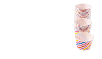 Cupcake paper baking cups over white background 