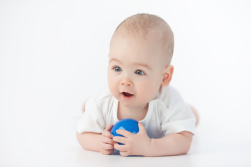 Baby with a blue toy