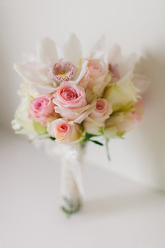 wedding bouquet  with orchids and roses