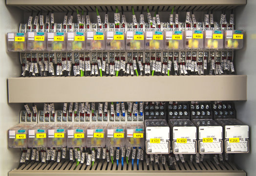 Relay panel with relays and wires closeup