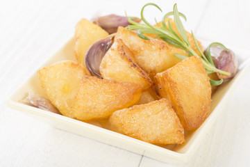 Roast Potatoes - White potatoes roasted with garlic and rosemary