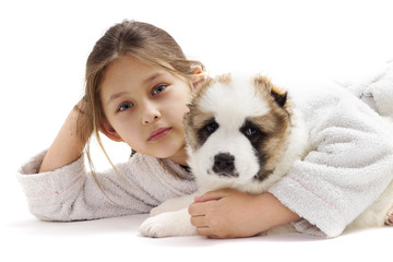 child and puppy