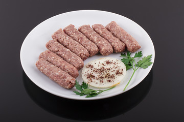 Raw Meatball serving on a plate