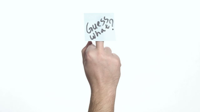 middle finger with a sticker guess what
