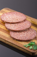 Raw Turkish Ottoman Sausage on the Wooden Board
