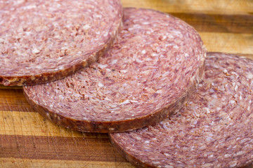 Raw Turkish Ottoman Sausage on the Wooden Board