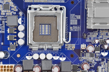 Printed computer motherboard, CPU socket, close up, DOF