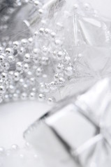 Silver gift box on white blur background