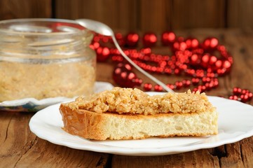 Homemade peanut paste on toast on white plate