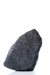 large piece of black bituminous coal on white background