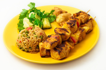 The chicken kebab on skewers with vegetables