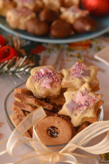 Various Christmas cookies decorated  in the glass bowl