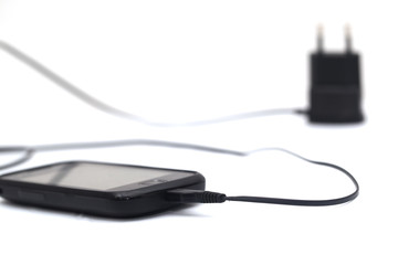 phone with an adapter on a white background