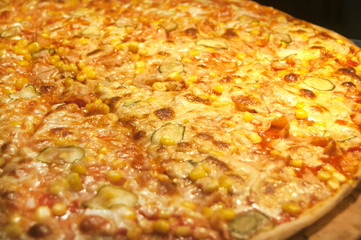Pizza to go by pieces in street pizzeria closeup