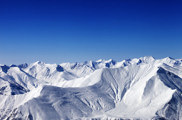 Fototapeta premium Winter snowy mountains with avalanche slope