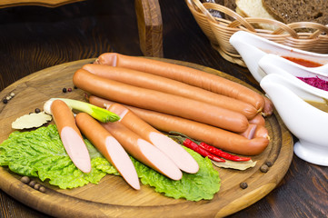 sausage on a wooden plate in a restaurant