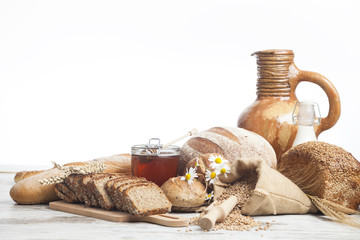 full corn bread, honey and milk © pawel70