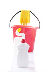 Obraz premium plastic bottle, cleaning sponges and gloves isolated