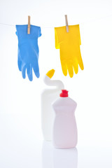plastic bottle, cleaning sponges and gloves isolated