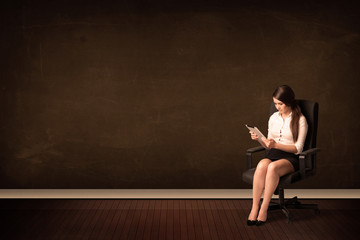 Businesswoman holding high tech tablet on background with copysp