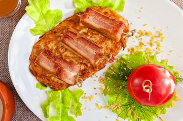 veal meat with bacon