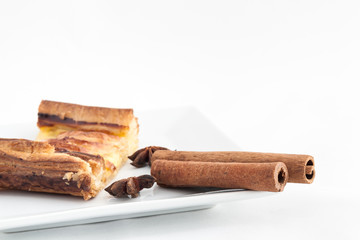 Apple pie with cinnamon isolated on white background
