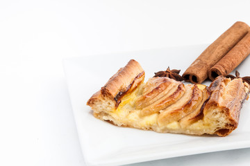 Apple pie with cinnamon isolated on white background