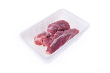 raw pork in plastic box package isolated on white background