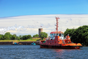 Tugboat and Wisloujscie Fortress. Gdansk, Poland.