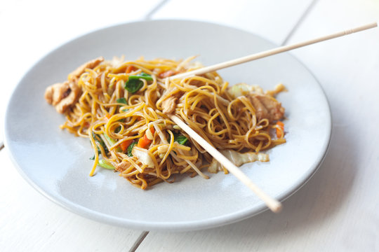 traditional Thai food, pad thai, noodles with vegetables and mea