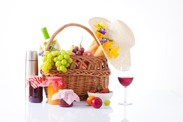 White wine, fruit and picnic food