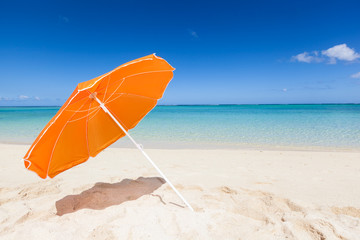 orange sunshade at the beach © picture.jacker