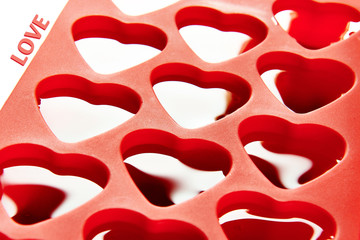 Red container for ice form of hearts