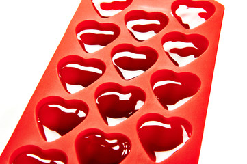 Red container for ice form of hearts