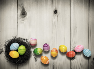 Easter eggs on wooden background