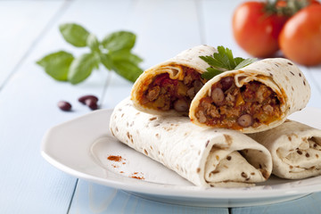 burritos wraps with meat beans and vegetables